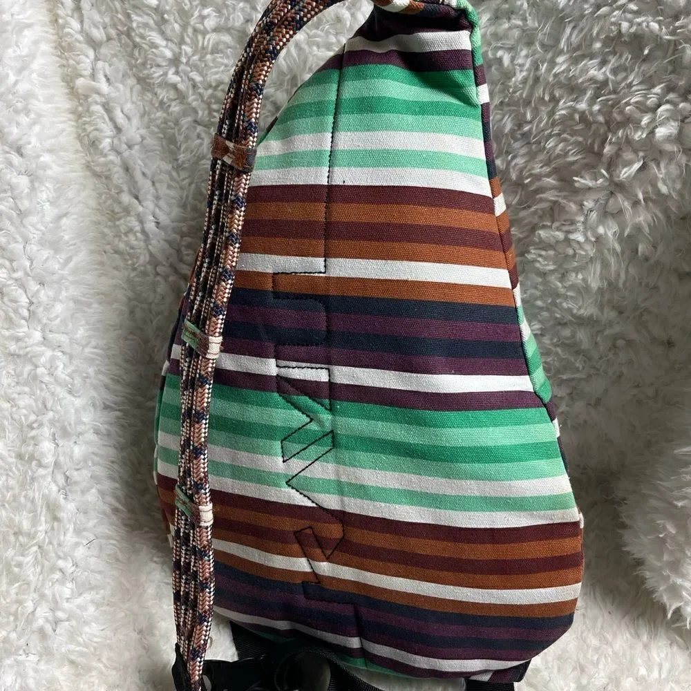 Kavu Rope sling back/ crossbody bag Canvas stripes Aztec color padded back .